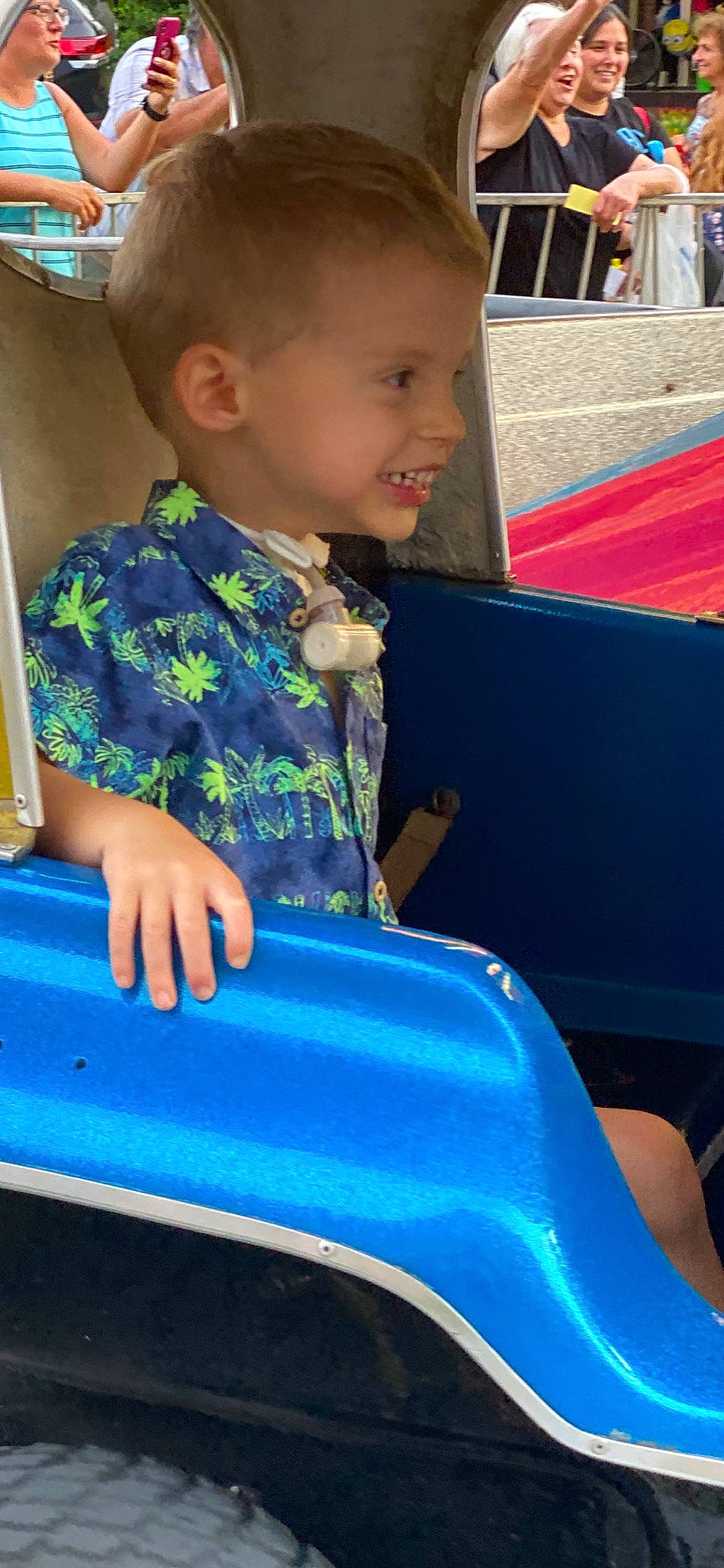 Brady joined the competition — help win amazing prizes! baby_toddler_clothing, beauty, blue, bumper, child, electric_blue, fun, joy, leisure, motor_vehicle, organ, person, photograph, recreation, riding_toy, sitting, smile, snapshot, summer, t_shirt