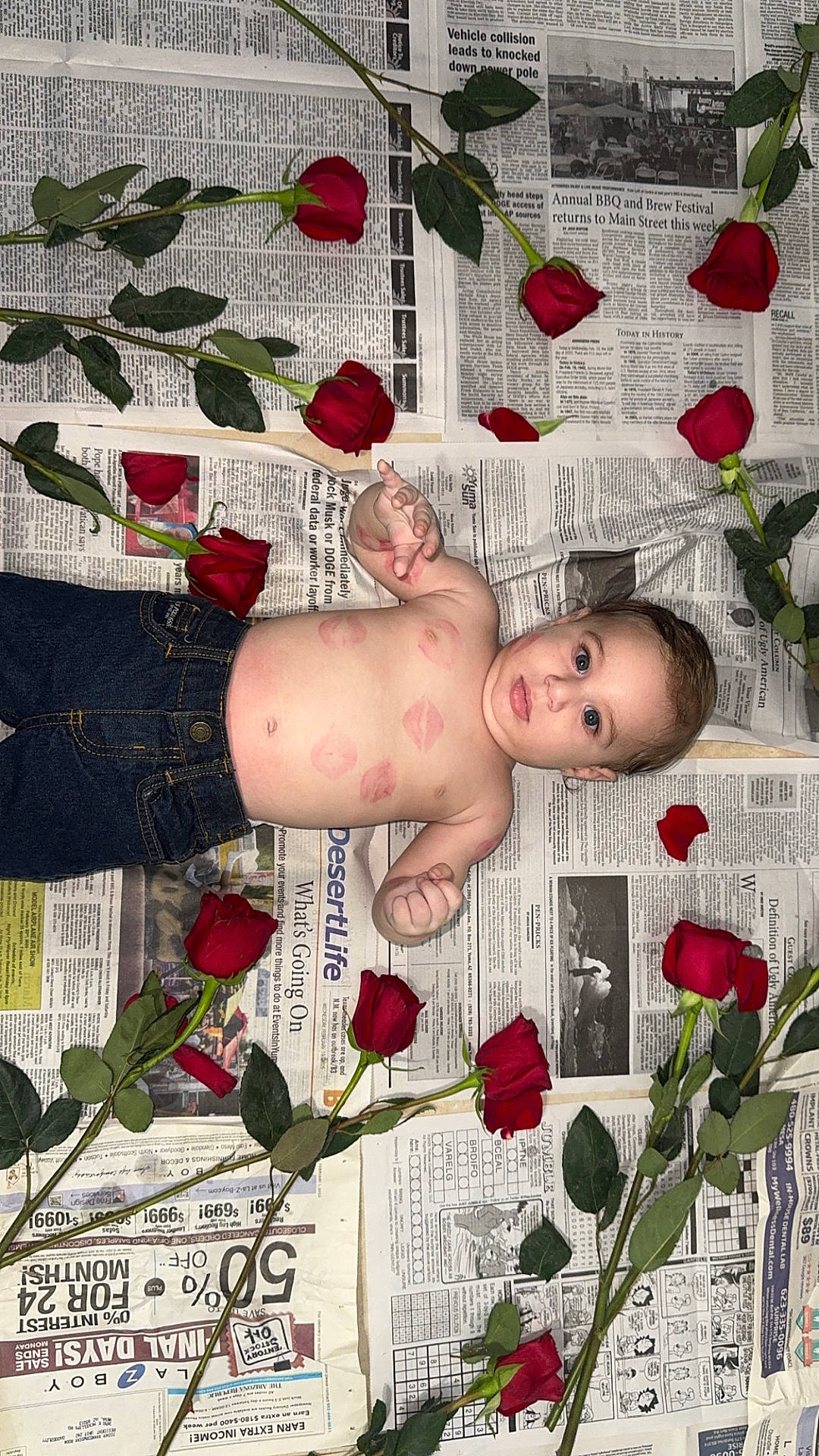 baby, clothing, face, flower, flowerarrangement, head, herbal, herbs, jeans, leaf, newspaper, pants, person, petal, photography, plant, portrait, pottedplant, rose, text