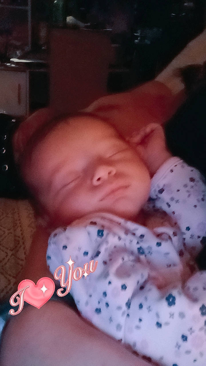 Amira is registered to the contest to win money with this photo: baby, baby_toddler_clothing, bedtime, carmine, cheek, child, comfort, finger, mouth, nap, nose, pattern, person, pink, skin, sleep, smile, thumb, toddler