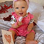 Jannah participe au concours pour gagner de l'argent avec cette photo : baby, bed, blanket, blue_eyes, brush, card, celebration, child, clothing, cute, girl, happy, headband, indoor, infant, pink, portrait, sitting, smiling, toy