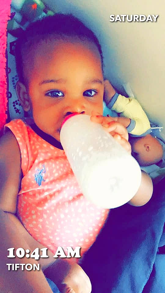 Jada joined the competition — help win amazing prizes! baby, baby_bottle, baby_products, bottle, cheek, child, drink, drinking, drinkware, mouth, nose, person, play, product, skin, smile, tableware, toddler