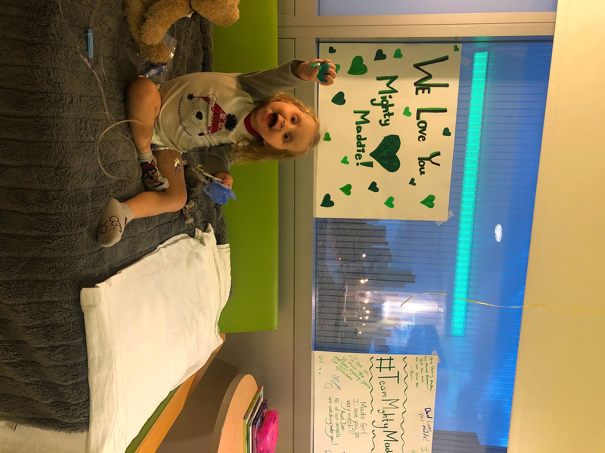 Madelyn is registered to the contest to win money with this photo: art, child, design, eyewear, fun, indoor_games_and_sports, luggage_and_bags, machine, organism, person, room, space, tree, visual_arts, wall, world