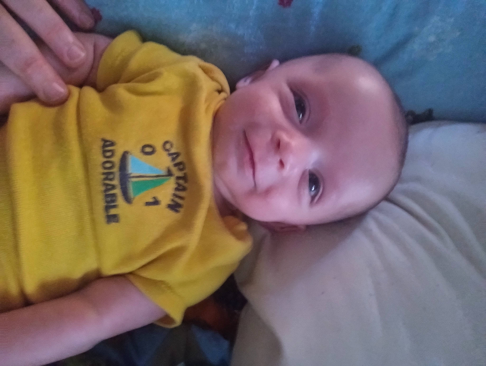 Westley is registered to the contest to win money with this photo: baby, baby_toddler_clothing, cheek, chin, comfort, ear, eyebrow, finger, forehead, gesture, human_body, iris, lip, mouth, nose, person, skin, sleeve, smile, thumb