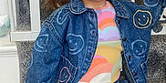 River joined the competition — help win amazing prizes! toddler, child, denim_jacket, denim_pants, smile, happy, stairs, carpet, railing, pigtail, clothing, indoor, person, cute, portrait, casual, colorful_shirt, fashion, young_child, sitting