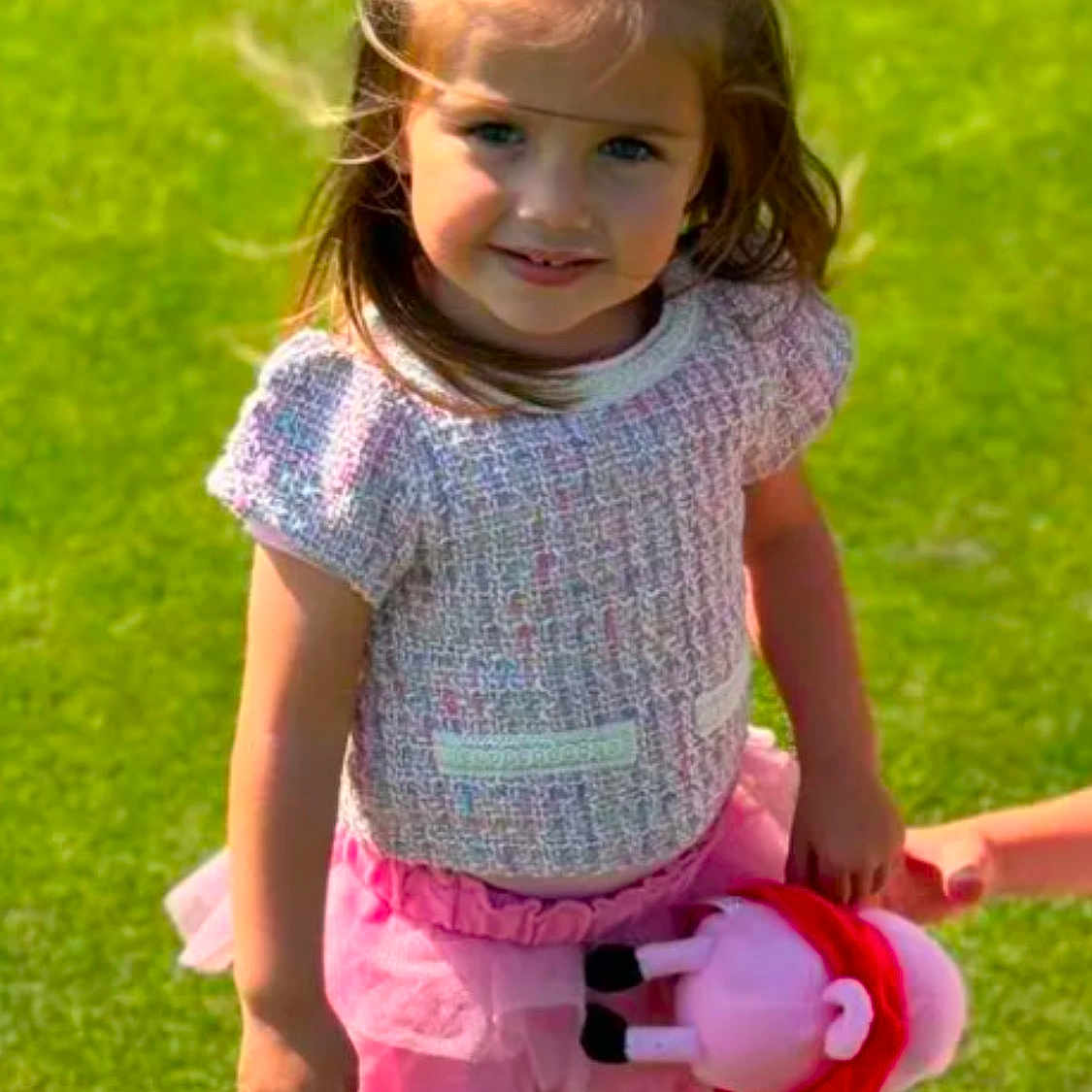 River joined the competition — help win amazing prizes! child, cute, daylight, fashion, girl, grass, happy, holding_hand, outdoor, person, pink_skirt, playful, plush_toy, portrait, smiling, summer, sunlight, textured_top, toy, young