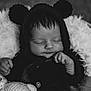 baby, bear_ears, black_and_white, blanket, child, close_up, cozy, cushion, cute, face, hand, infant, knitted_clothing, newborn, peaceful, portrait, resting, sleeping, soft_texture, teddy_bear