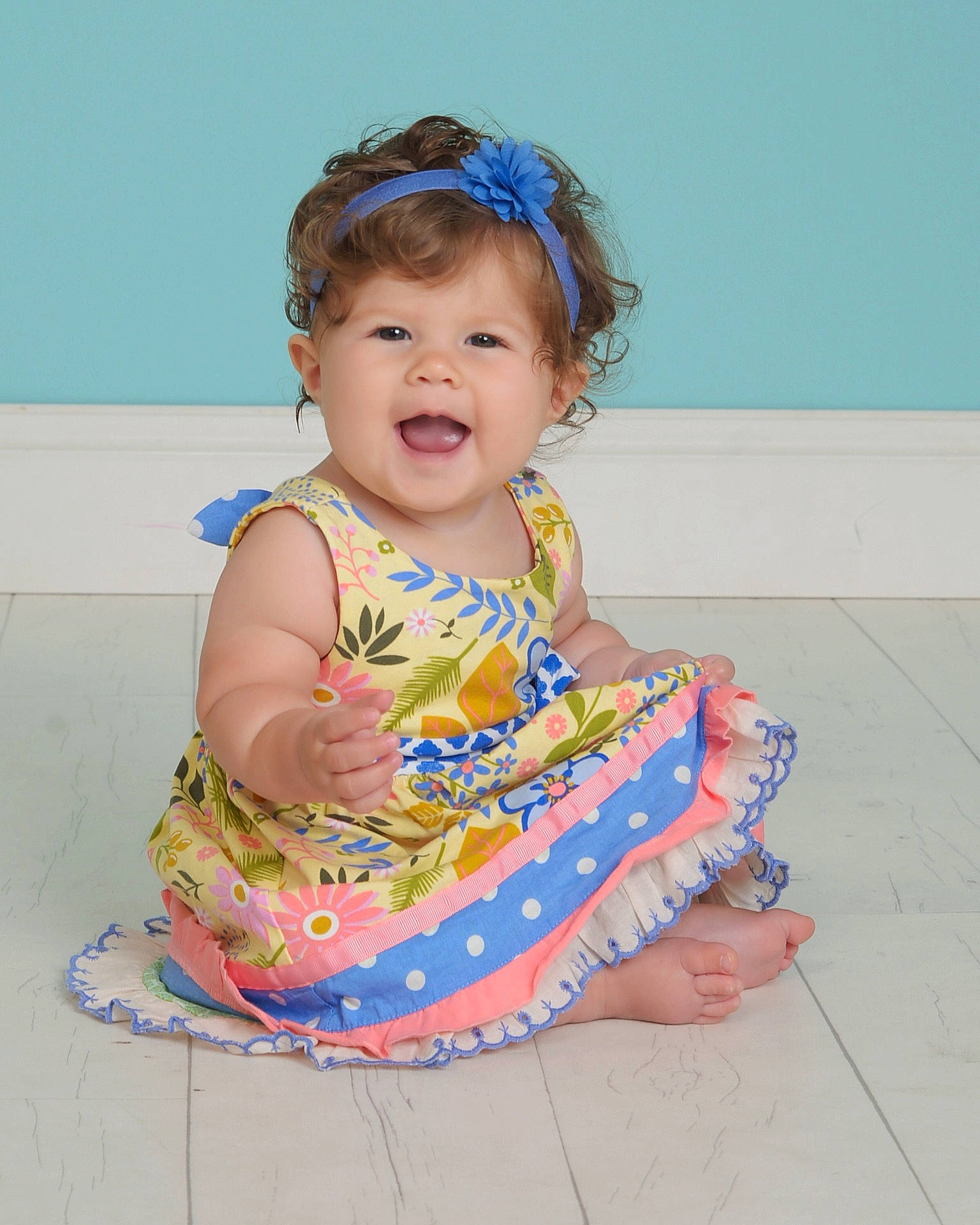 Nova Ray is registered to the contest to win money with this photo: baby_products, child, design, fun, girl, hair_accessory, headgear, infant, material, pattern, person, pink, play, product, sitting, skin, textile, toddler