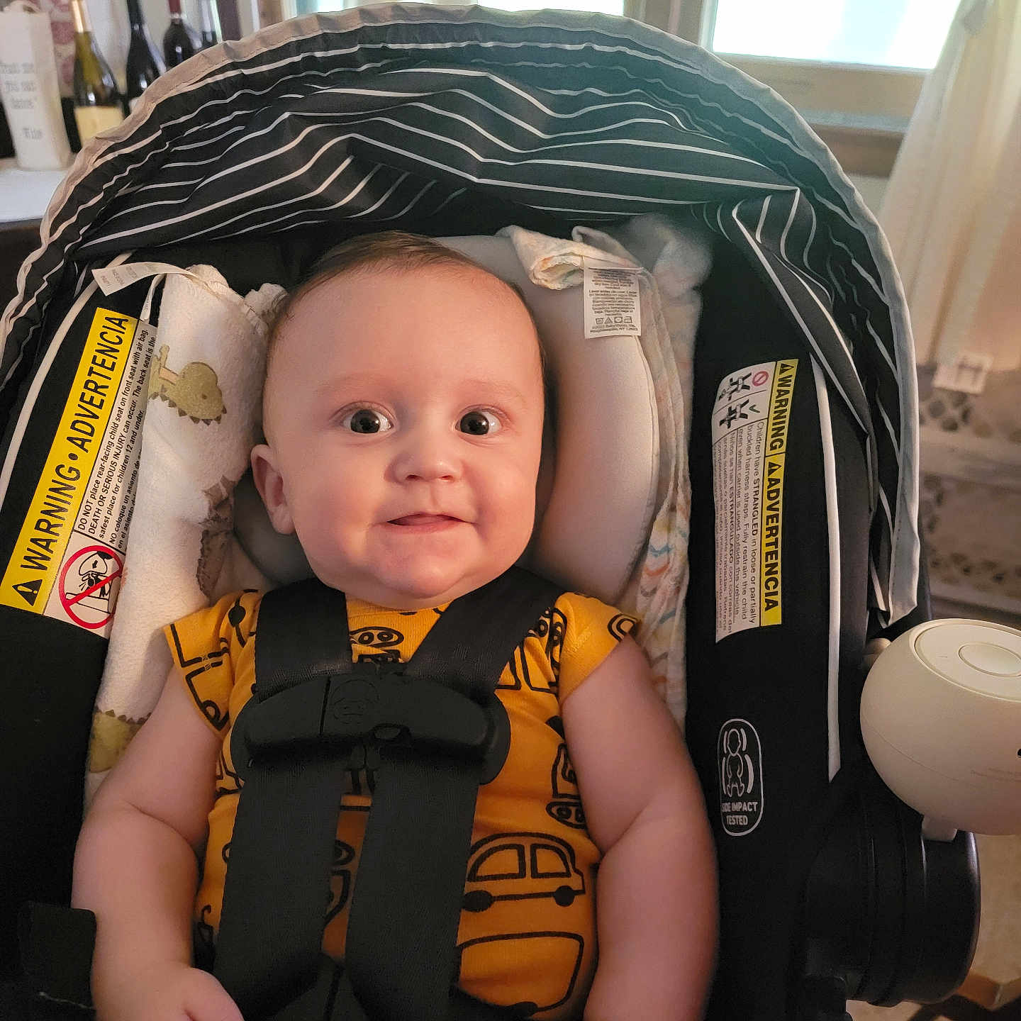 Jacob is registered to the contest to win money with this photo: baby, bodypart, clothing, crib, cushion, face, finger, furniture, hand, hat, head, homedecor, infantbed, person, photography, portrait, stroller, t_shirt, transportation, vehicle