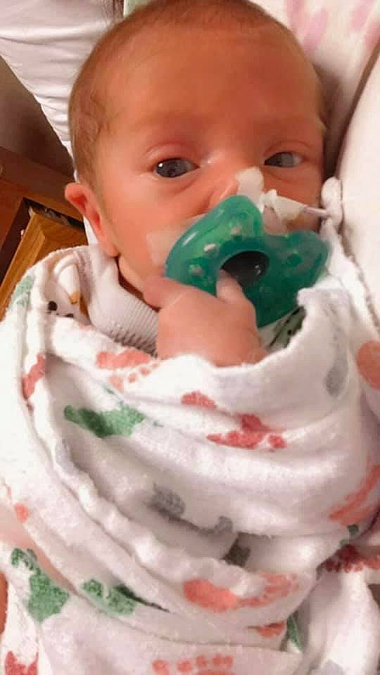 Jaxtyn is registered to the contest to win money with this photo: baby, baby_products, baby_toddler_clothing, cheek, child, close_up, drinkware, eyelash, green, happy, jaw, lip, mouth, nose, person, photography, skin, sweetness, toddler, tooth