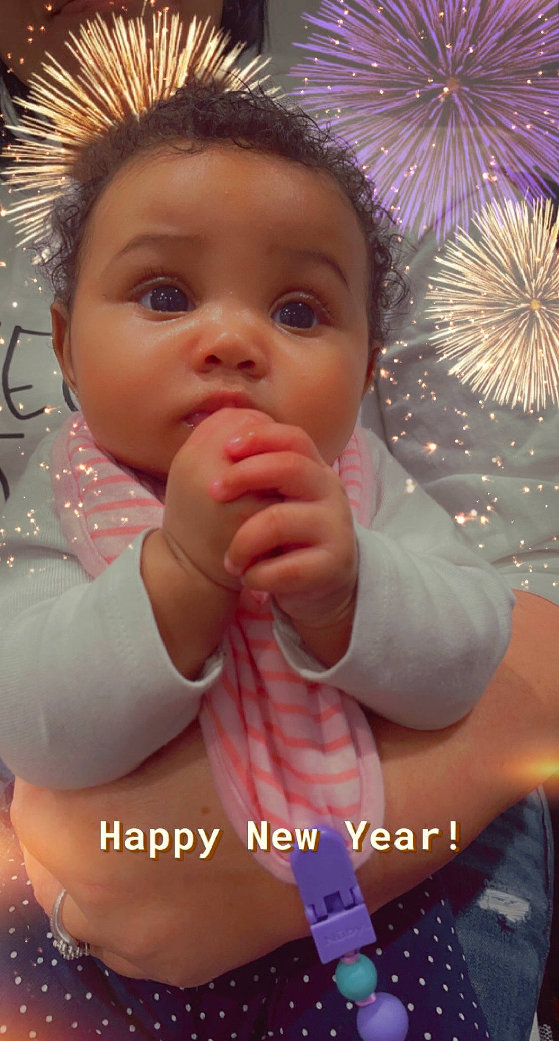 Alessia is registered to the contest to win money with this photo: baby, baby_toddler_clothing, bracelet, cheek, child, eyelash, finger, fireworks, gesture, hand, holiday, love, nail, new_years_eve, person, pink, skin, sweetness, thumb, toddler