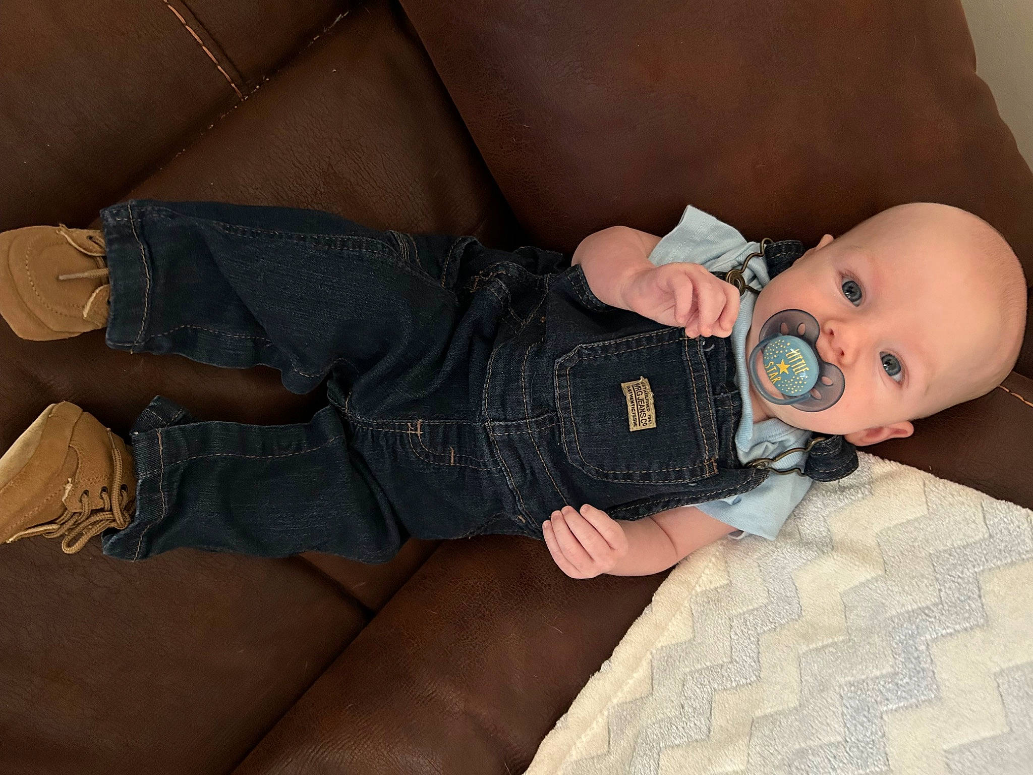 Louie joined the competition — help win amazing prizes! abdomen, baby, baby_toddler_clothing, chest, child, comfort, elbow, eyewear, human_leg, knee, lap, leg, person, personal_protective_equipment, sitting, skin, sleeve, thigh, toddler, trunk
