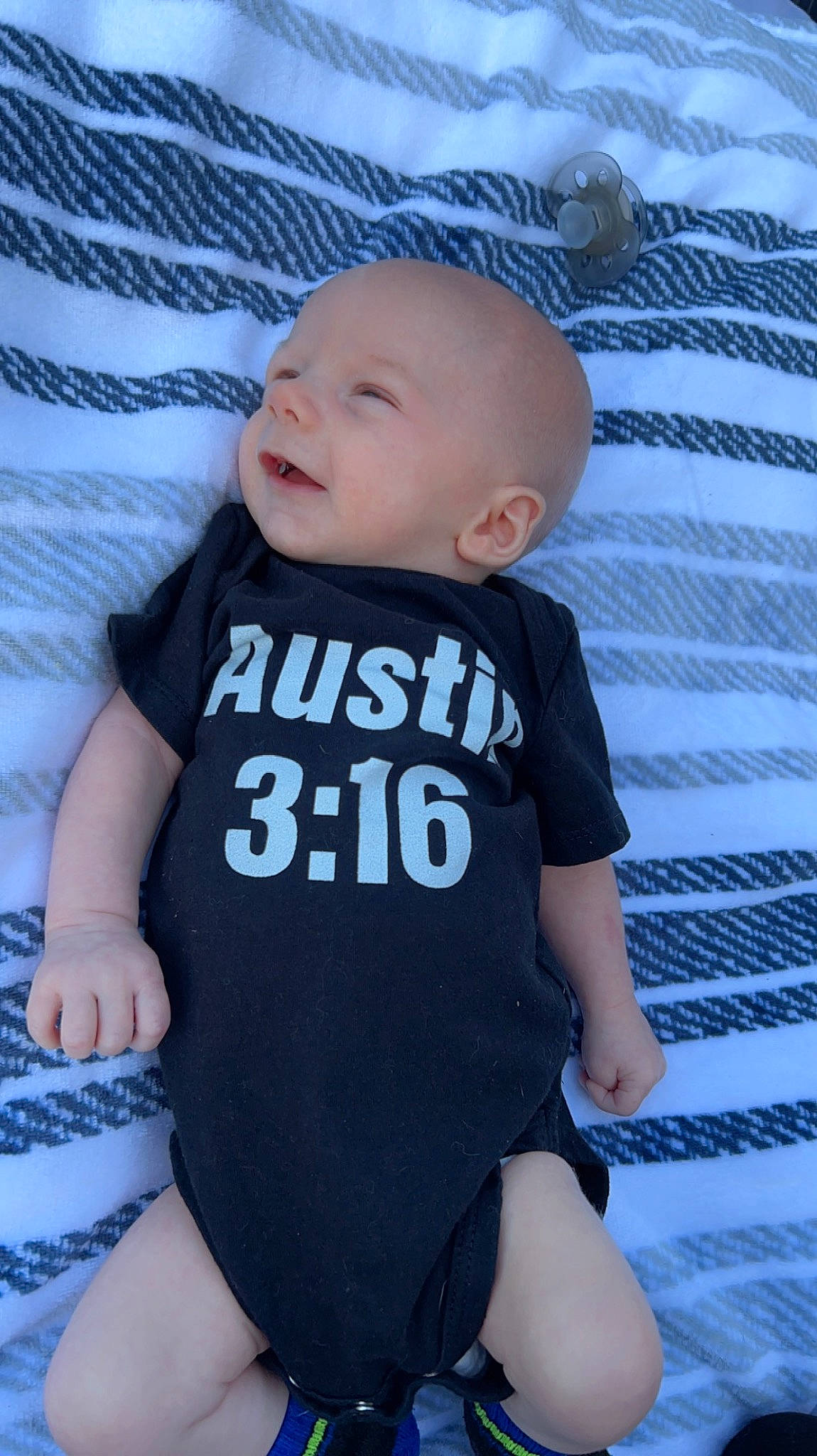 Louie is registered to the contest to win money with this photo: azure, baby, baby_toddler_clothing, cool, eye, face, finger, grey, happy, human, leg, muscle, neck, person, skin, sleeve, standing, textile, thigh, toddler
