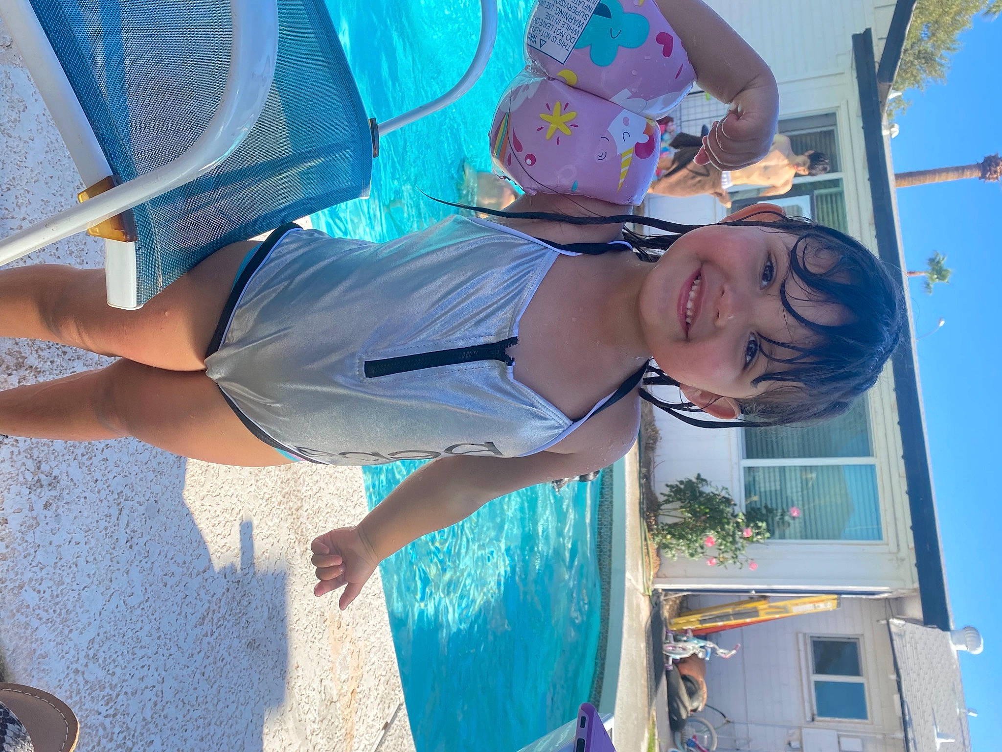 Alessandra joined the competition — help win amazing prizes! azure, blue, building, cool, daytime, eyewear, fun, green, happy, hat, joy, leisure, light, person, photograph, shorts, smile, summer, thigh, water