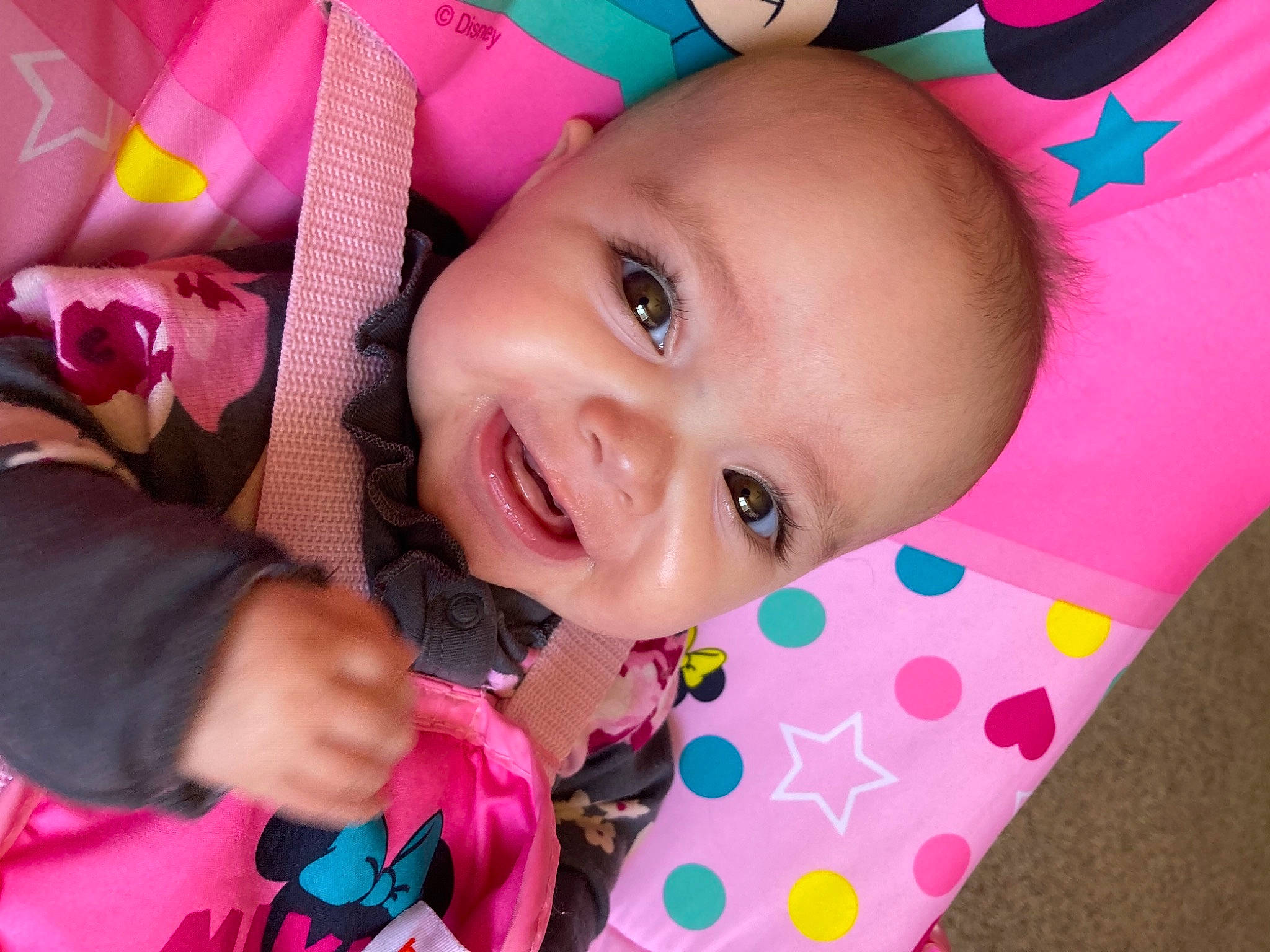 Laurie is registered to the contest to win money with this photo: baby, baby_toddler_clothing, cheek, eye, face, facial_expression, finger, happy, head, iris, lip, nose, person, pink, product, purple, skin, smile, textile, toddler