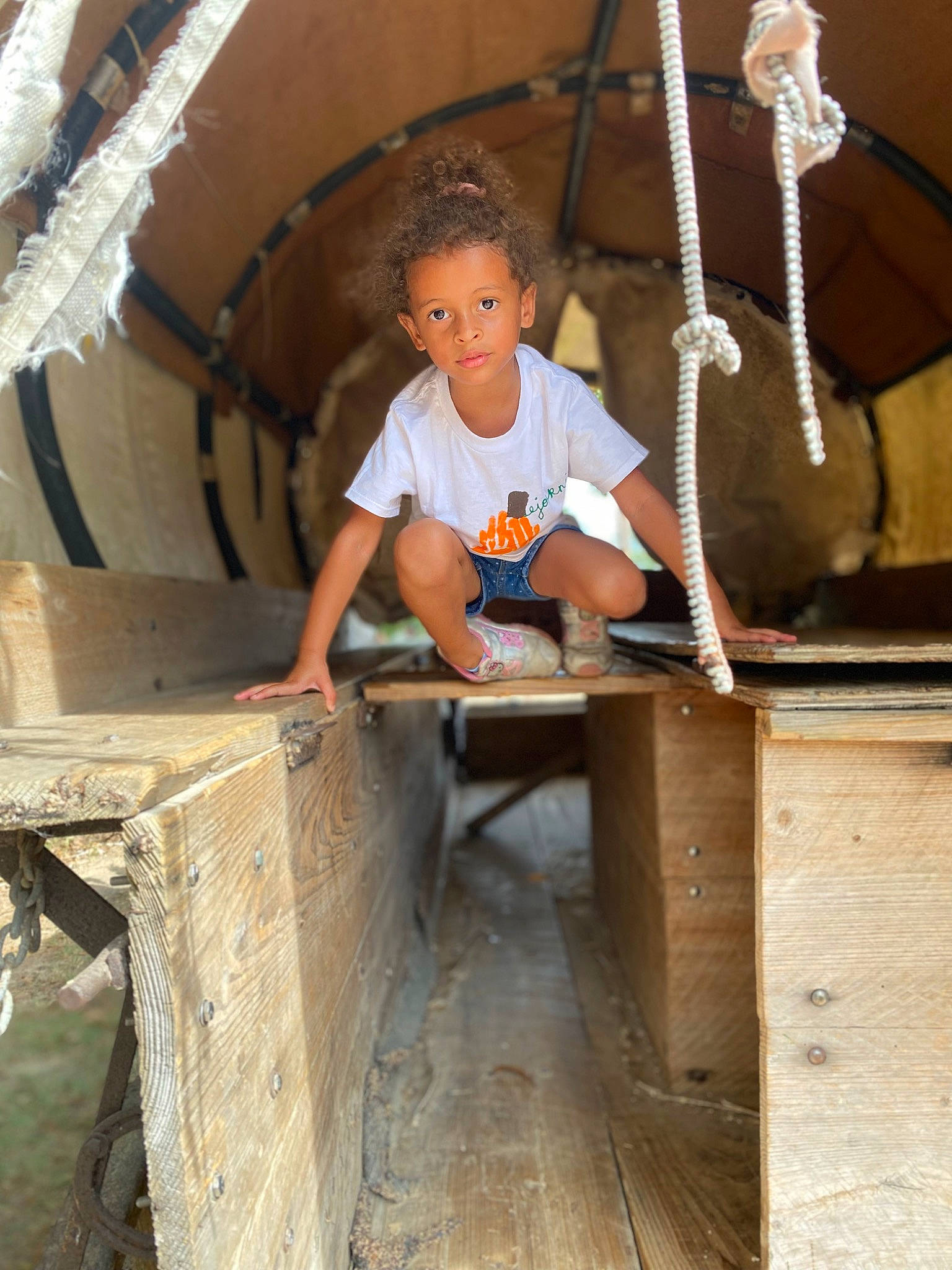 Journi is registered to the contest to win money with this photo: auto_part, automotive_wheel_system, beam, blue_collar_worker, concrete, construction_worker, fun, house, leisure, person, recreation, rope, shorts, sitting, soil, t_shirt, toddler, wood