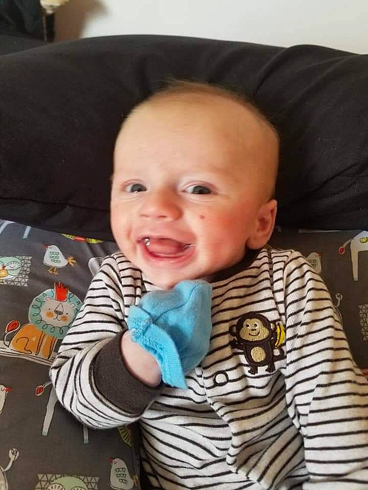 Tammelin is registered to the contest to win money with this photo: baby, baby_toddler_clothing, cheek, child, comfort, ear, eyebrow, fun, happy, iris, linens, mouth, nose, person, seat_belt, sitting, skin, sleeve, smile, t_shirt