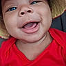 baby, blue_eyes, camera, child, close_up, cute, face, happy, hat, indoors, infant, joyful, onesie, open_mouth, pooh_bear, portrait, red_clothing, seated, smiling, storybook_character