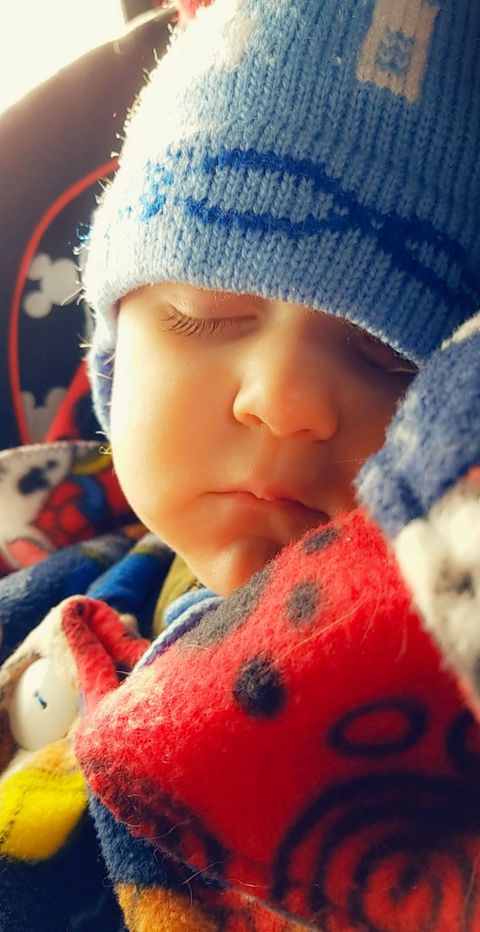 Carson joined the competition — help win amazing prizes! baby, beanie, bonnet, cap, cheek, child, close_up, crochet, doll, head, headgear, knit_cap, knitting, lip, nose, person, red, skin, toddler, toy