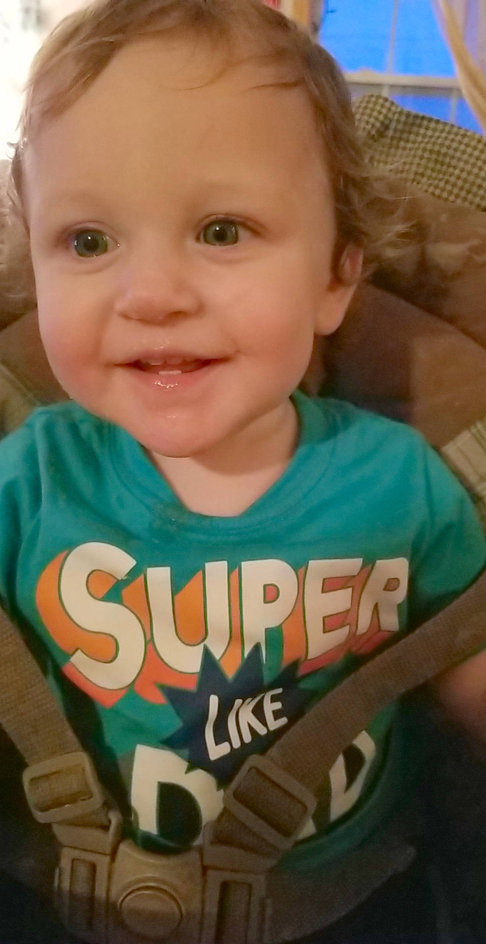 Carson is registered to the contest to win money with this photo: baby, cheek, child, chin, cool, eye, face, facial_expression, forehead, green, head, joy, lip, mouth, nose, person, product, skin, smile, t_shirt