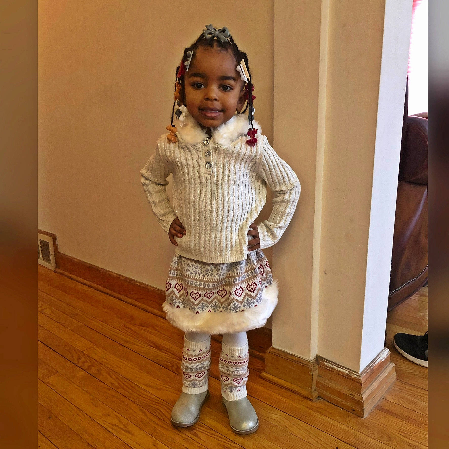 Mia is registered to the contest to win money with this photo: beige, cheek, child, child_model, clothing, fawn, outerwear, person, shoe, sleeve, toddler, wool