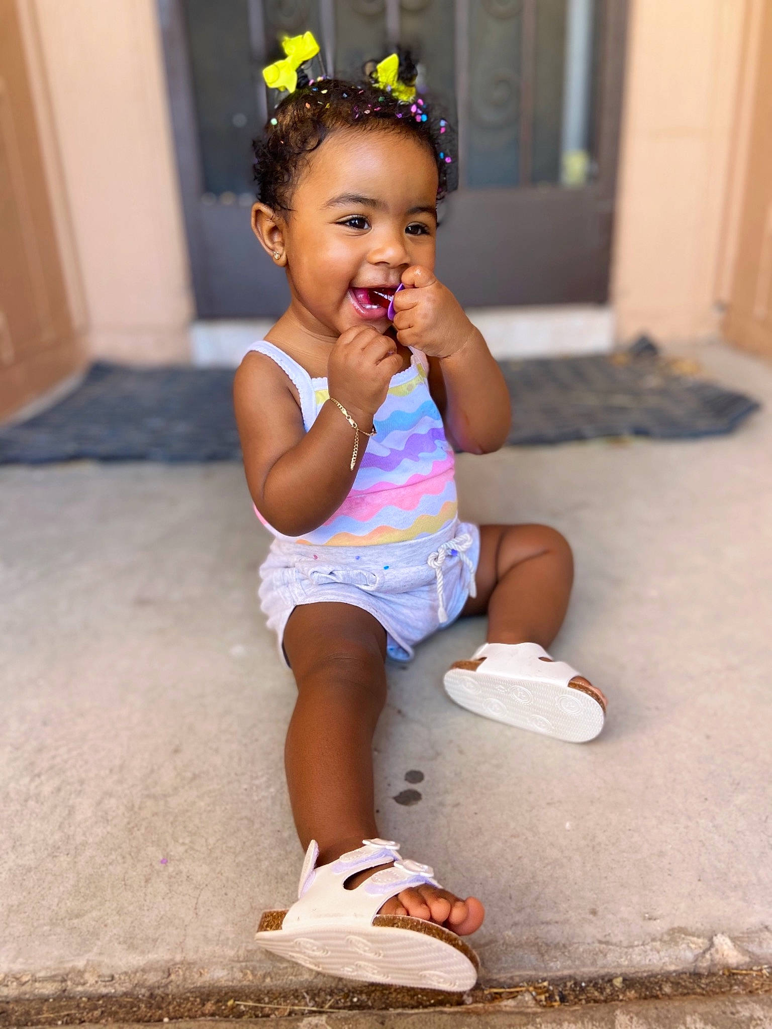Jaida is registered to the contest to win money with this photo: baby_toddler_clothing, cool, door, eye, face, flash_photography, fun, happy, head, iris, leg, people, person, photograph, smile, standing, summer, thigh, toddler, white