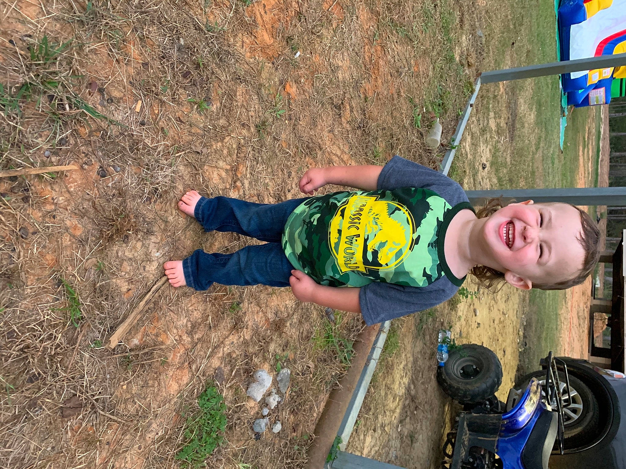 Case is registered to the contest to win money with this photo: adventure, child, electric_blue, fun, grass, happy, joy, leg, leisure, outdoor_play_equipment, people_in_nature, person, plant, play, recreation, shorts, smile, soil, t_shirt, tire