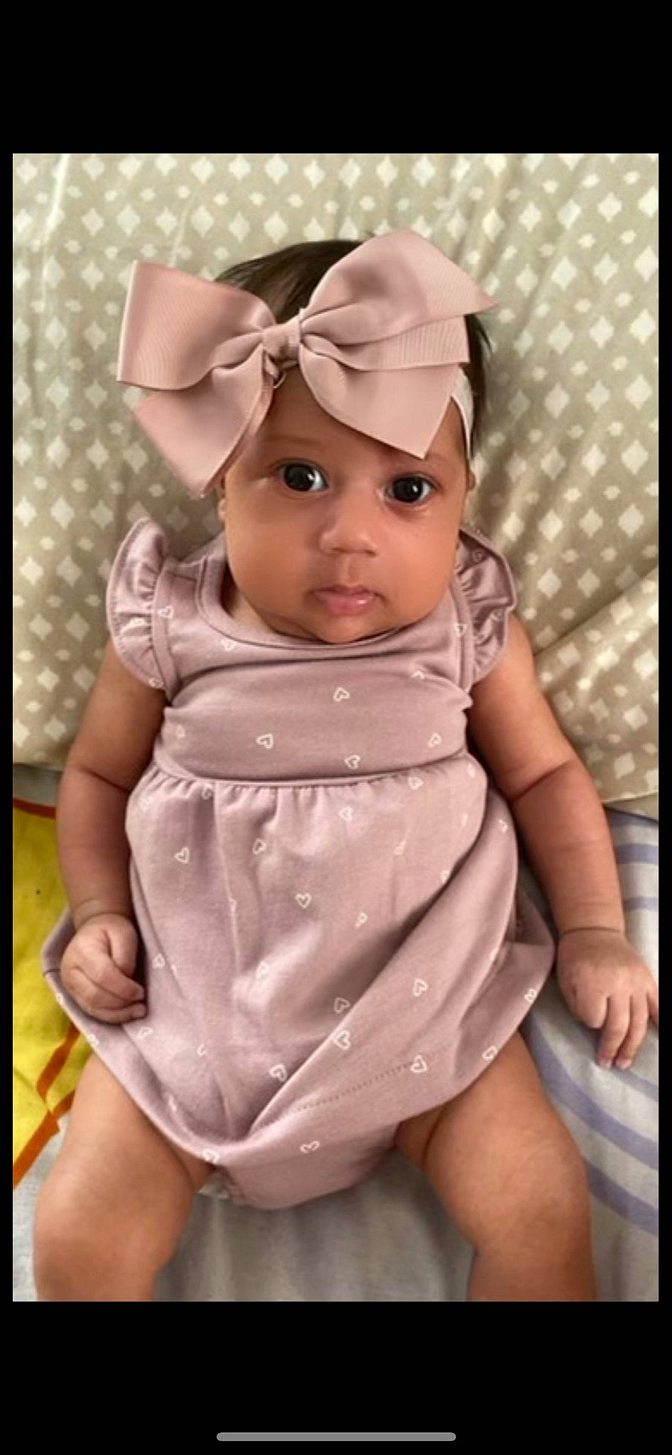 Amiiyah is registered to the contest to win money with this photo: baby, baby_products, baby_toddler_clothing, baby_toys, cap, cheek, child, doll, fashion_accessory, finger, font, gesture, headwear, linens, pattern, peach, person, pink, sleeve, thumb