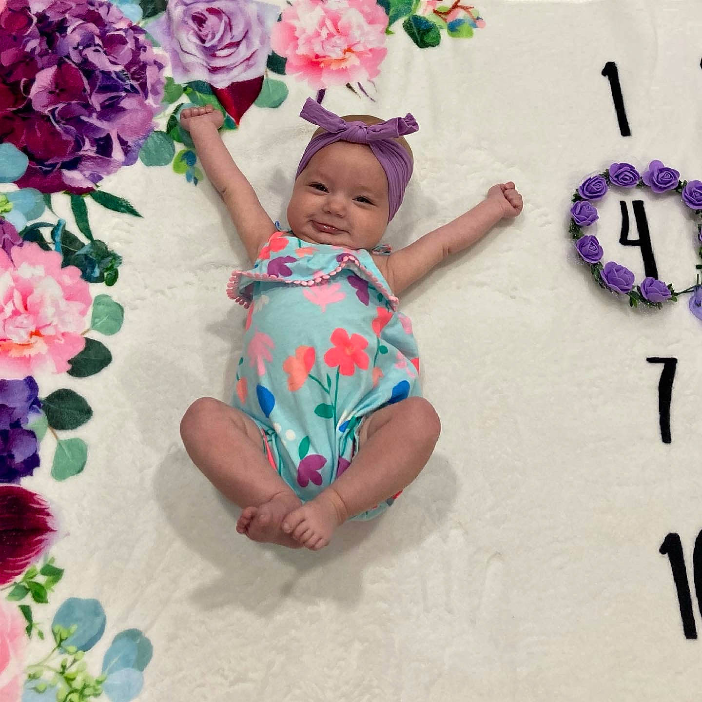 Sydney joined the competition — help win amazing prizes! arm, baby, baby_toddler_clothing, child, finger, flower, hand, happy, hat, headgear, headwear, magenta, person, petal, photograph, pink, plant, product, rose, skin