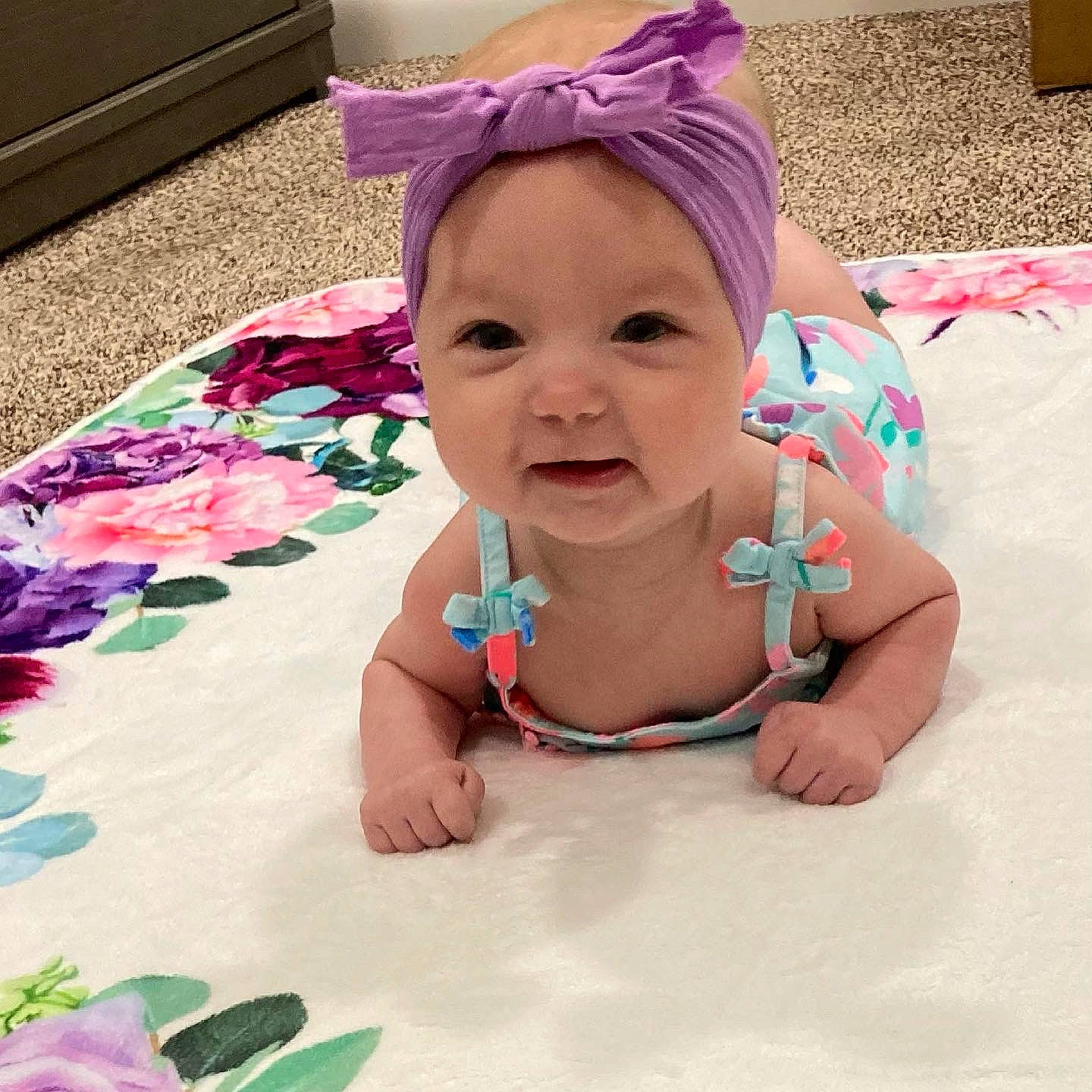 Sydney joined the competition — help win amazing prizes! baby, baby_products, baby_toddler_clothing, cap, child, comfort, fun, grass, happy, headwear, leisure, linens, magenta, mammal, pattern, person, pink, play, purple, skin