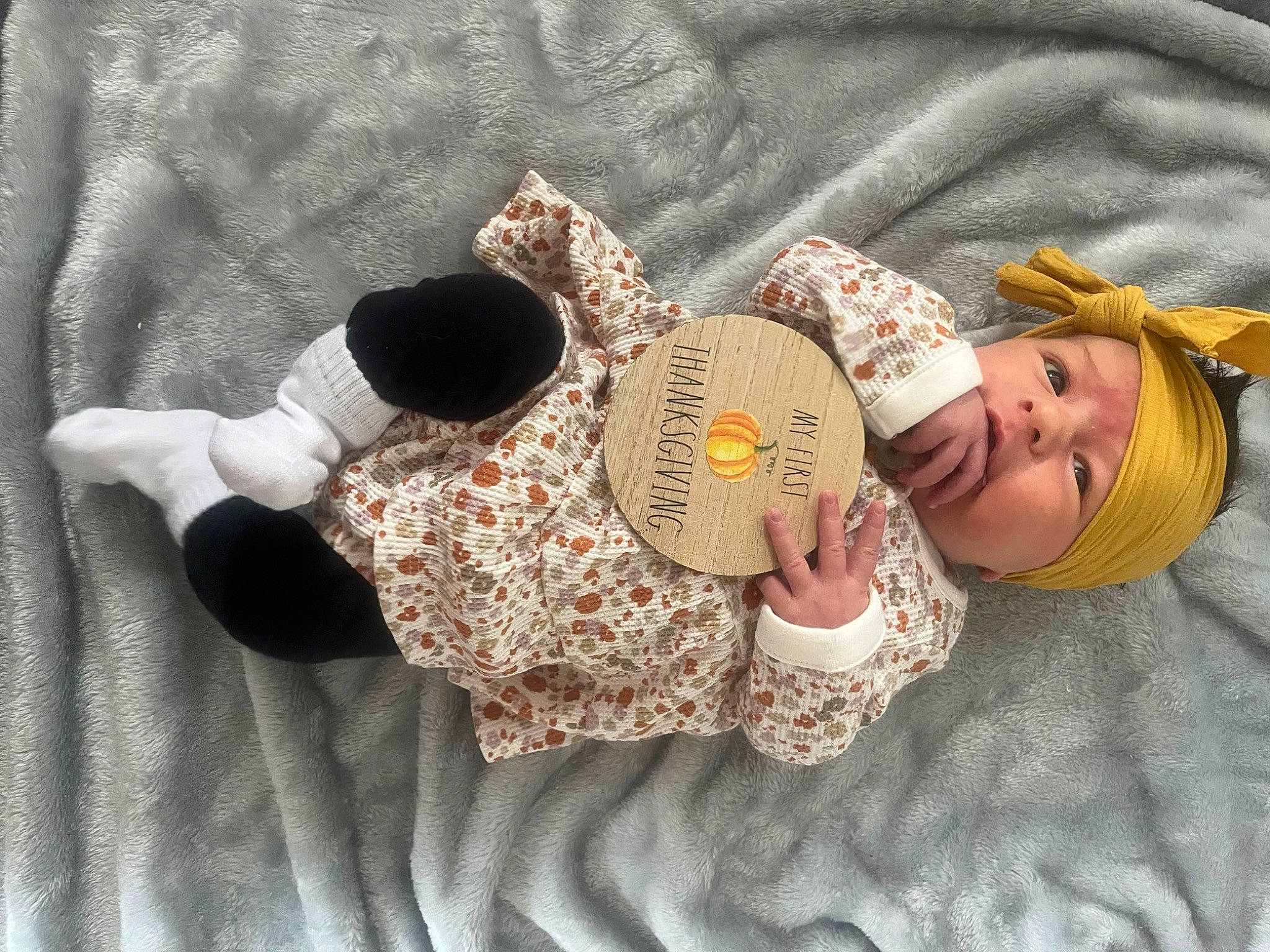 Josie is registered to the contest to win money with this photo: baby, baby_products, baby_toddler_clothing, child, comfort, costume_hat, fashion_accessory, happy, hat, headgear, headwear, illustration, linens, mammal, pattern, person, room, sleeve, stuffed_toy, sun_hat