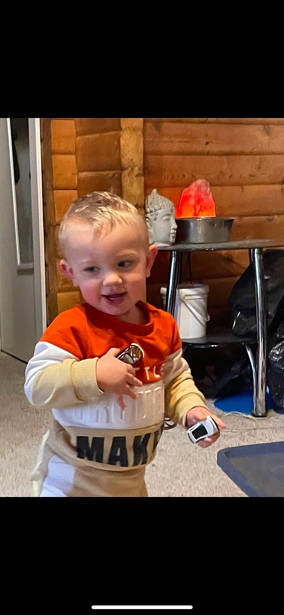 Kyng joined the competition — help win amazing prizes! baby, baby_toddler_clothing, cheek, child, door, flooring, fun, hair, happy, orange, person, play, room, sitting, sleeve, smile, t_shirt, toddler, wood