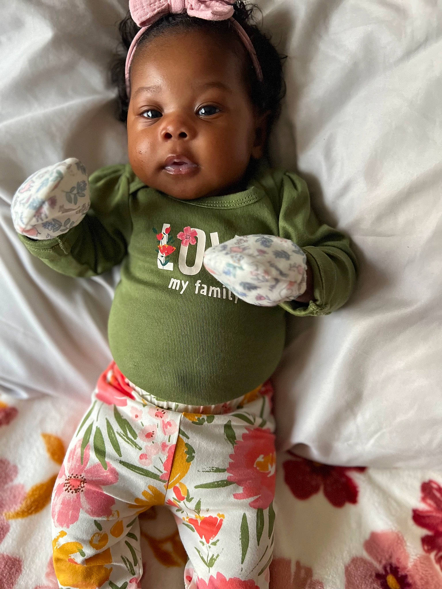 Avaeha is registered to the contest to win money with this photo: baby, baby_products, baby_toddler_clothing, cap, child, comfort, fashion_accessory, gesture, happy, head, headband, headpiece, linens, pattern, person, skin, sleeve, t_shirt, thigh, toddler