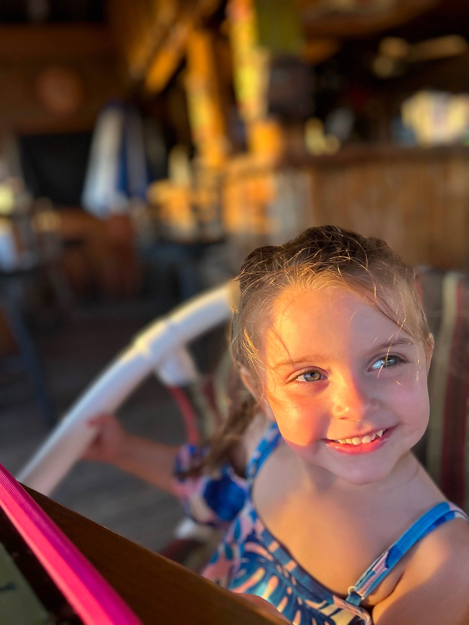 Aria is registered to the contest to win money with this photo: automotive_design, automotive_exterior, brown_hair, child, electric_blue, eyewear, flash_photography, fun, happy, jewellery, joy, leisure, person, portrait_photography, recreation, room, sitting, skin, smile, toddler