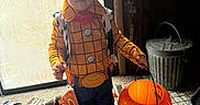 Garrett joined the competition — help win amazing prizes! carpet, child, costume, cowboy_boots, cowboy_hat, cute, door, dress_up, expression, floor, halloween, indoor, metal_trash_can, person, pumpkin_bucket, toddler, toy, toy_story, window, woody