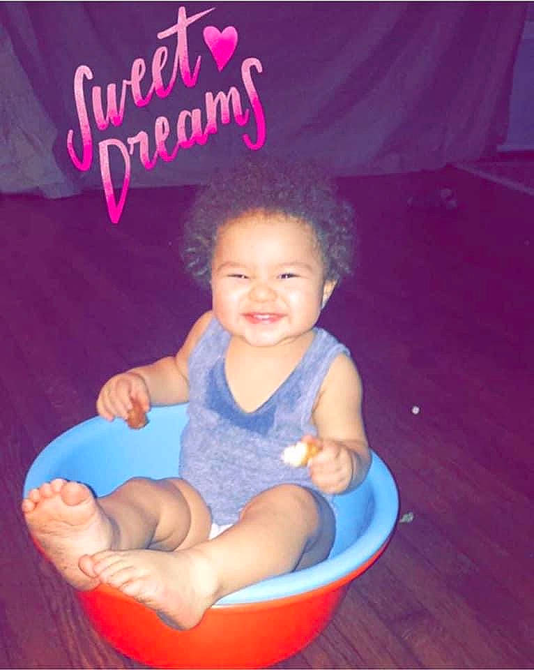 Kyngston is registered to the contest to win money with this photo: baby, baby_products, baby_toddler_clothing, child, comfort, eye, finger, fun, happy, lap, magenta, person, pink, product, purple, sitting, skin, smile, thigh, toddler