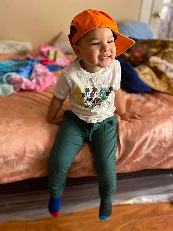 Kyngston joined the competition — help win amazing prizes! baby, baby_toddler_clothing, baseball_cap, cap, child, comfort, couch, face, happy, hardwood, hat, headwear, joy, person, pink, product, sitting, skin, sleeve, smile