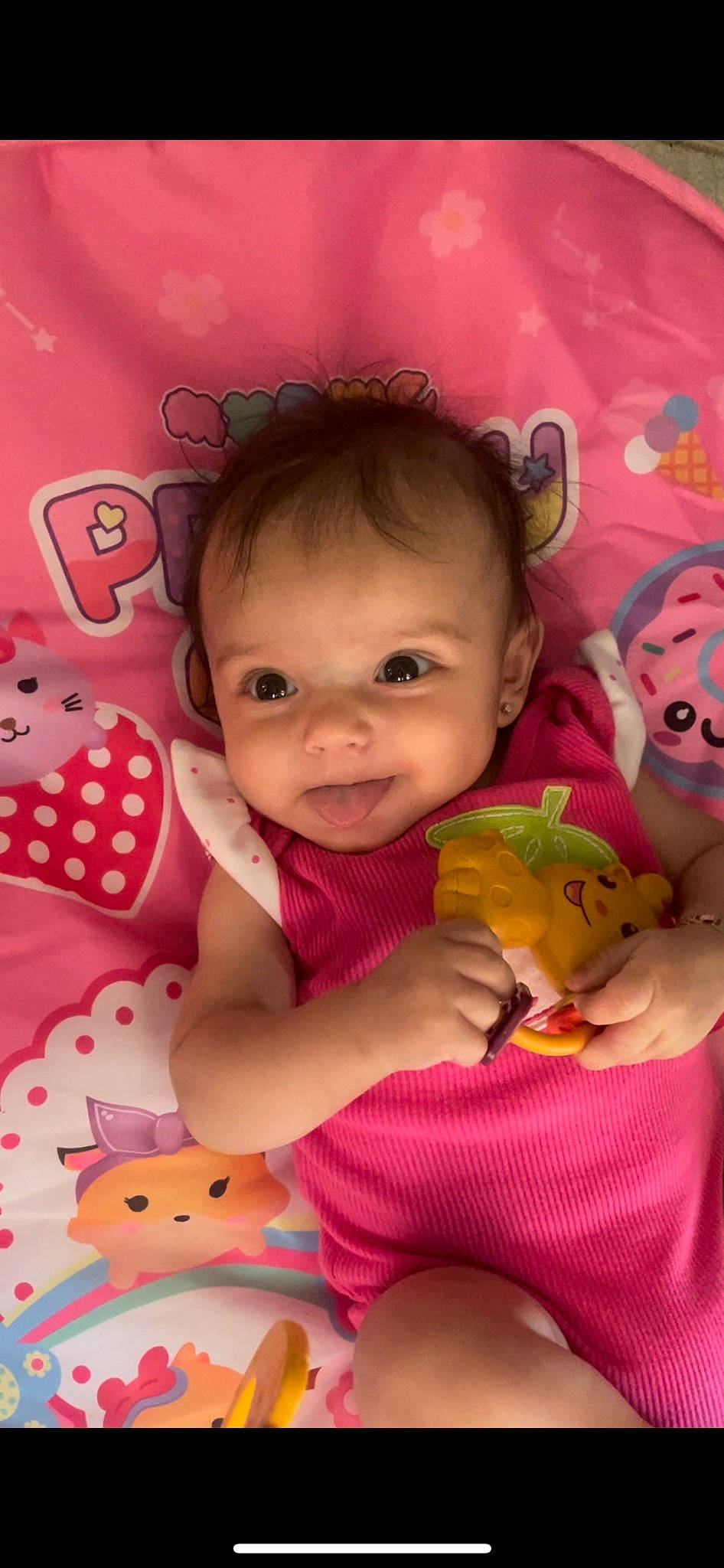 Hannah is registered to the contest to win money with this photo: baby, baby_toddler_clothing, beauty, cheek, child, eye, finger, fun, happy, head, human_body, iris, lip, nose, person, pink, product, skin, smile, textile