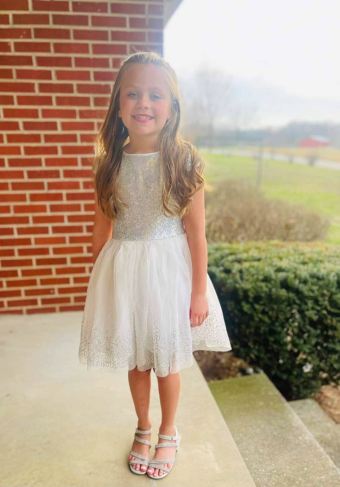 Oakleigh joined the competition — help win amazing prizes! blond, bridal_party_dress, brown_hair, clothing, day_dress, dress, event, fashion_design, formal_wear, grass, hair, happy, joy, long_hair, neck, person, pink, plant, shoulder, sleeve