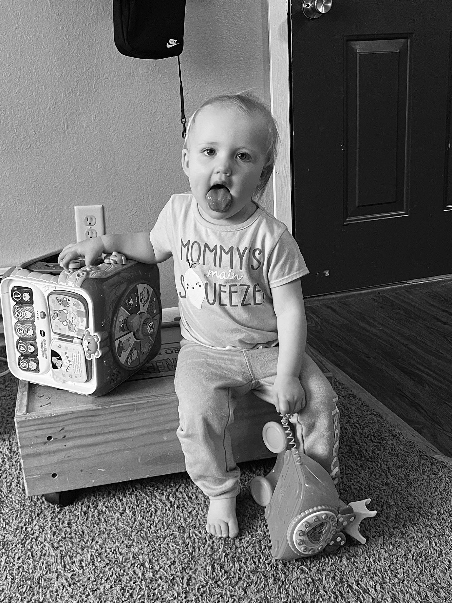 Harmony Rose is registered to the contest to win money with this photo: baby_toddler_clothing, black, black_and_white, child, cool, door, flash_photography, happy, monochrome, monochrome_photography, person, photograph, shorts, sitting, snapshot, sneakers, style, t_shirt, tints_and_shades, toddler