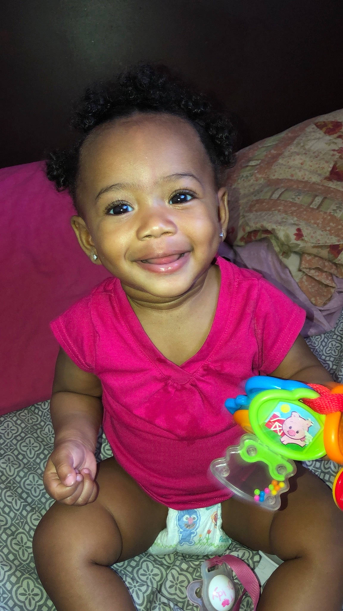 Emani is registered to the contest to win money with this photo: adaptation, baby, cheek, child, eye, fun, iris, joy, lip, mouth, person, play, sitting, skin, smile, toddler