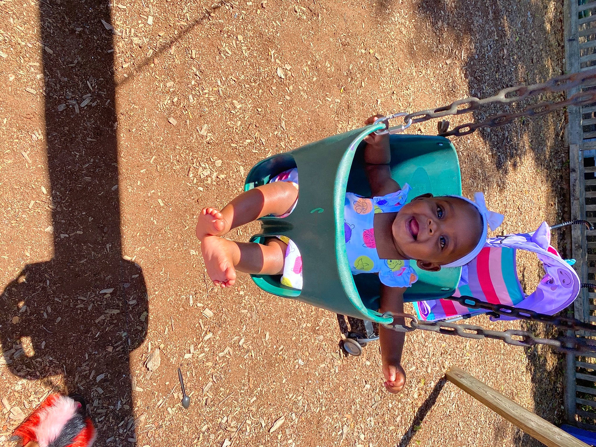 Kyleigh is registered to the contest to win money with this photo: baby, baby_toddler_clothing, child, city, electric_blue, fun, happy, human_settlement, leisure, outdoor_play_equipment, people_in_nature, person, play, public_space, recreation, sand, shadow, smile, soil, toddler