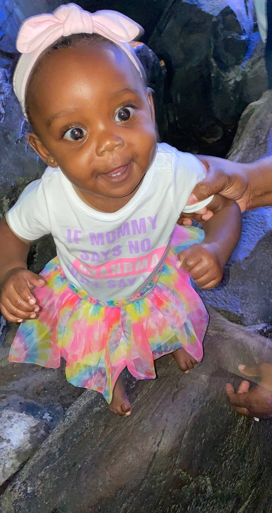 Kyleigh is registered to the contest to win money with this photo: baby, baby_toddler_clothing, black, cheek, child, eye, face, fun, gesture, hand, happy, head, iris, joy, magenta, person, pink, purple, skin, smile