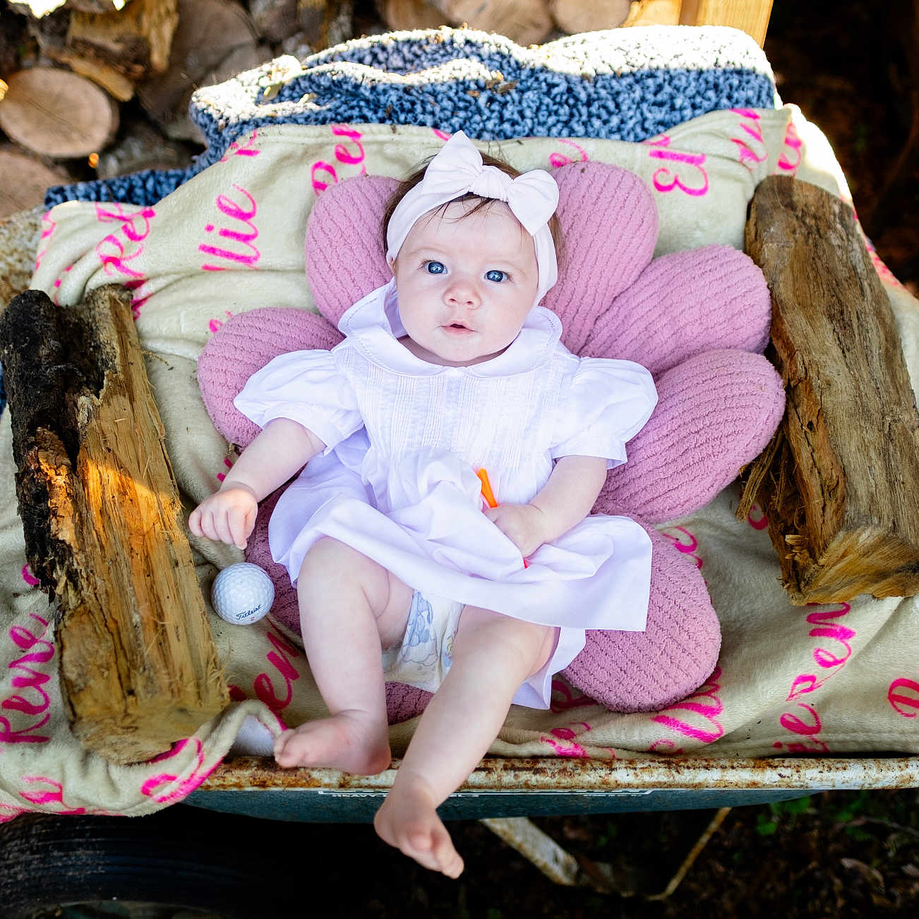 Elliana joined the competition — help win amazing prizes! baby, bed, blanket, cap, clothing, couch, face, furniture, hat, head, newborn, person, photography, plant, portrait, toy, transportation, tree, vehicle, wood