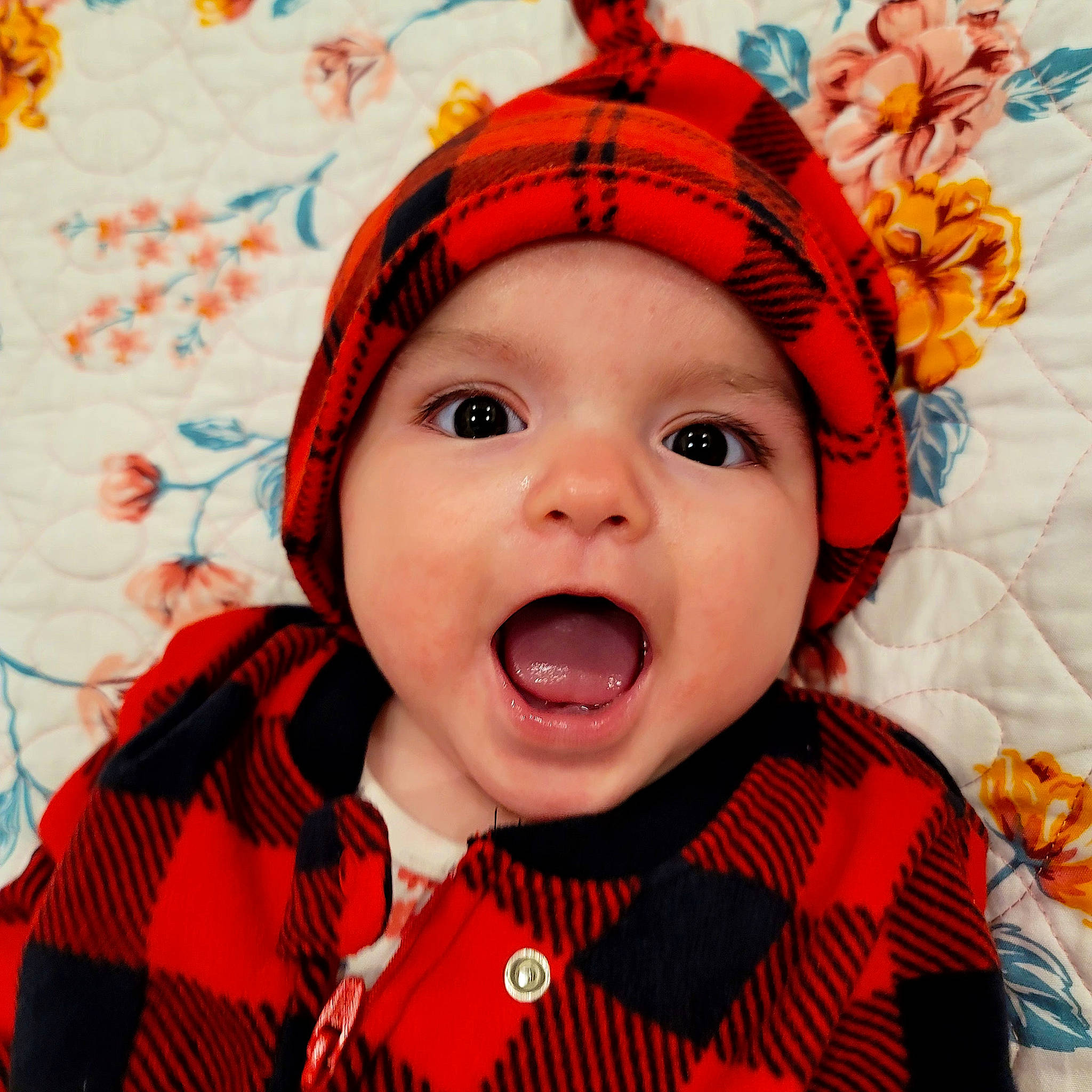 Maeve is registered to the contest to win money with this photo: baby, baby_toddler_clothing, cheek, child, chin, collar, costume_hat, eye, eyebrow, fun, happy, headwear, iris, lip, mouth, nose, orange, person, pink, sleeve