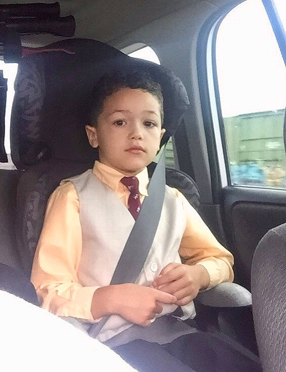 Emilio is registered to the contest to win money with this photo: auto_part, car, car_seat, family_car, head_restraint, person, seat_belt, vehicle