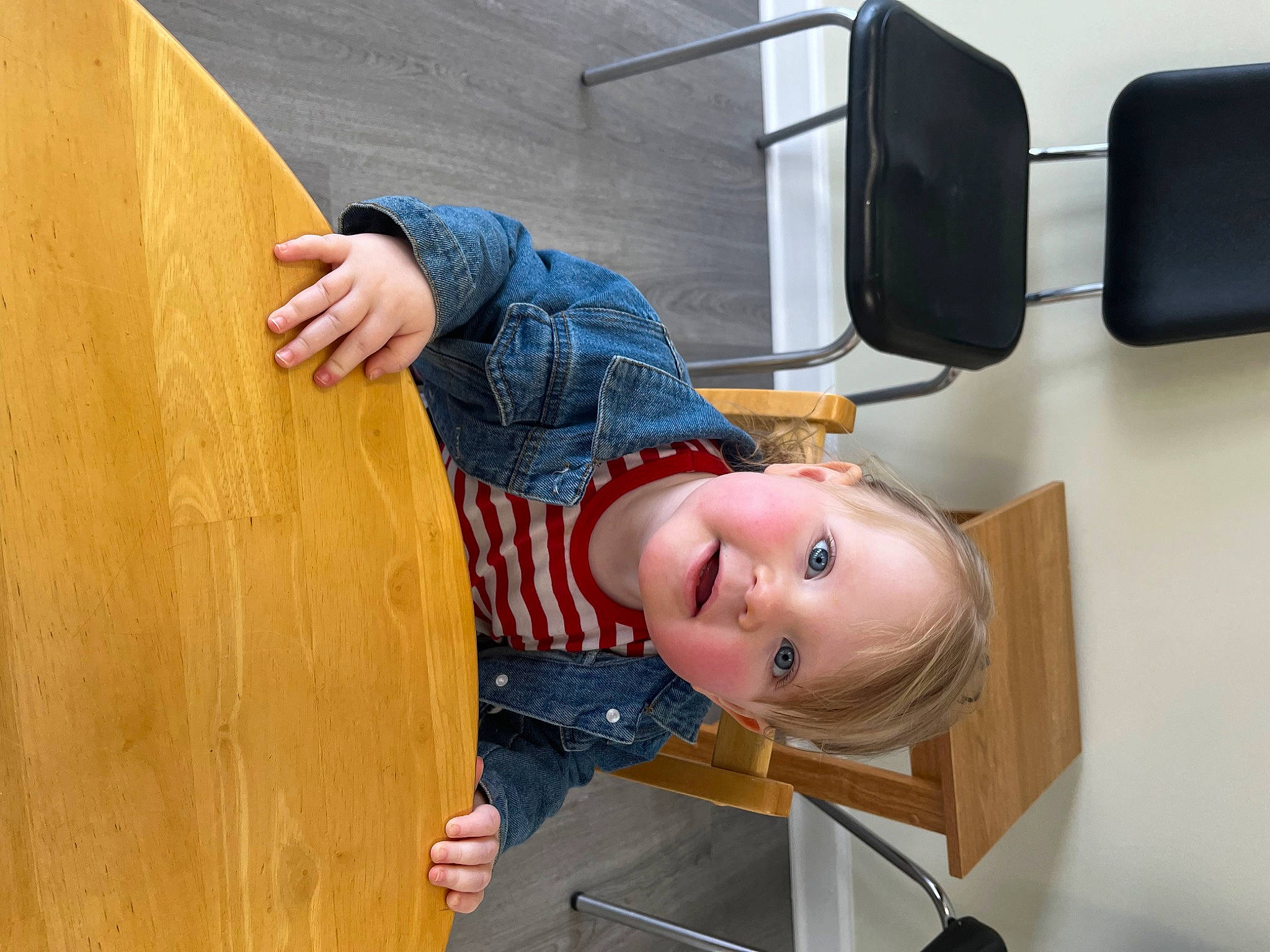 Kinley is registered to the contest to win money with this photo: audio_equipment, baby, chair, child, denim, elbow, eyewear, flooring, fun, hardwood, leisure, person, room, sitting, smile, stairs, table, toddler, varnish, wood