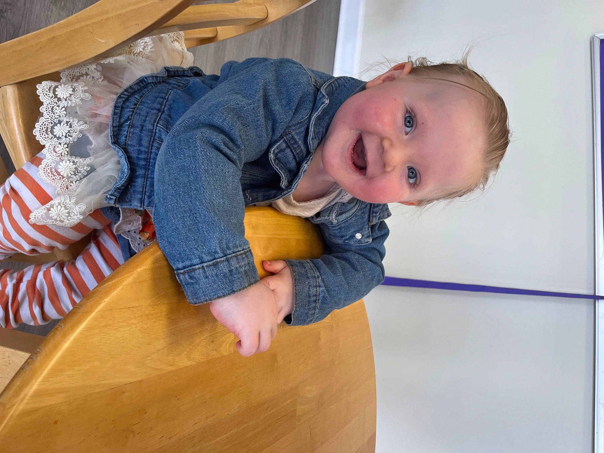 Kinley is registered to the contest to win money with this photo: baby, baby_toddler_clothing, child, comfort, electric_blue, finger, floor, flooring, fun, happy, hardwood, joy, person, room, sitting, sleeve, smile, thumb, toddler, varnish
