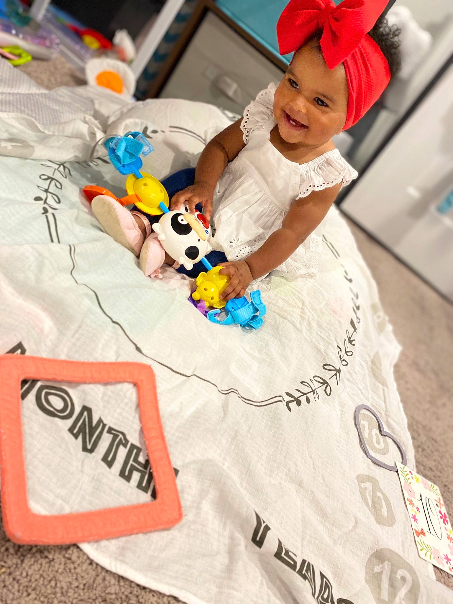 Gloria is registered to the contest to win money with this photo: baby_toddler_clothing, beauty, child, event, fashion, font, fun, happy, headwear, human, joy, leisure, people, person, pink, product, sleeve, smile, summer, t_shirt