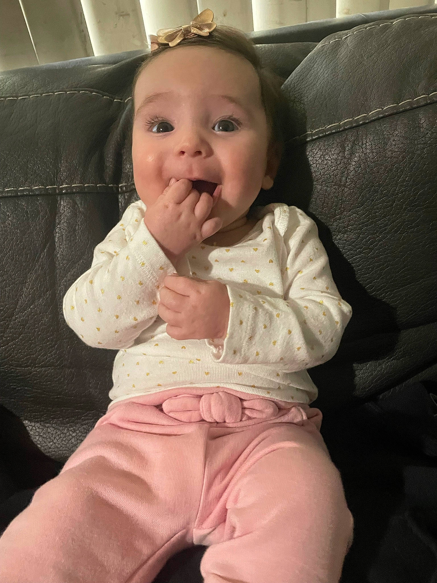 Alia is registered to the contest to win money with this photo: baby, baby_toddler_clothing, cheek, chin, comfort, eye, face, facial_expression, finger, gesture, hair, head, human_body, iris, lip, mouth, nose, person, skin, sleeve