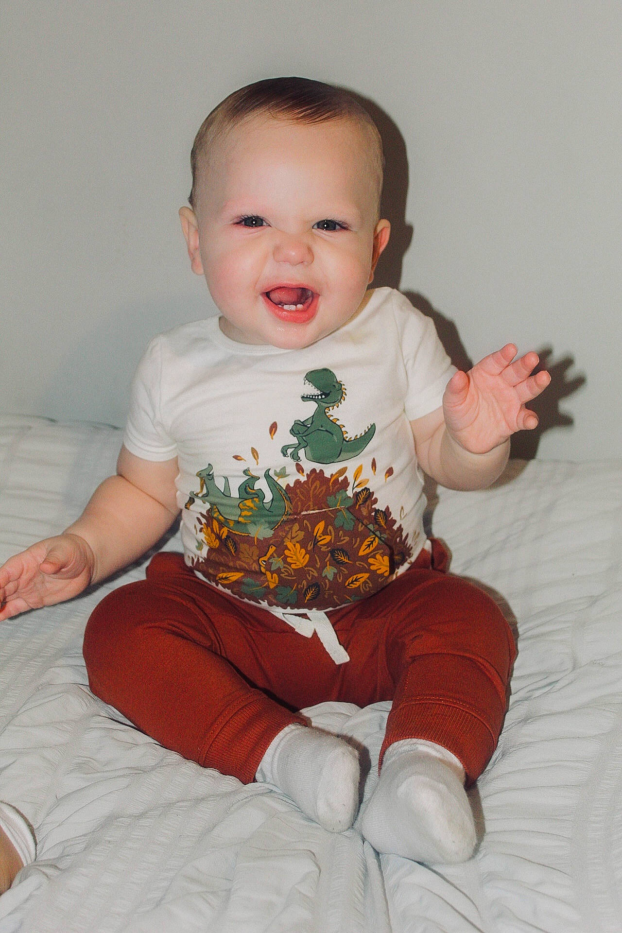 Aziel joined the competition — help win amazing prizes! baby, baby_toddler_clothing, cheek, child, chin, comfort, face, fun, hairstyle, happy, head, lap, person, sitting, skin, sleeve, smile, sock, t_shirt, thigh